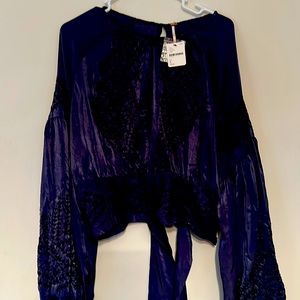 Free people woman’s blouse. NWT.  Size large
